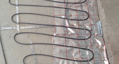 Монтаж електричної теплої підлоги при вході у будинок