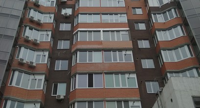 Утеплення балкону 6-й поверх з декором під цеглу (кирпич) 