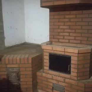 Каміно піч з плитою і грубою. 