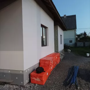 Утеплення стін приватного будинка.