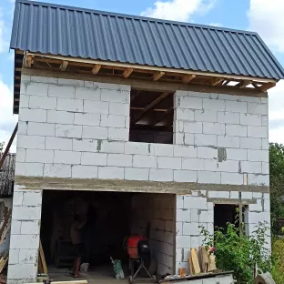 Гараж на два поверхи.